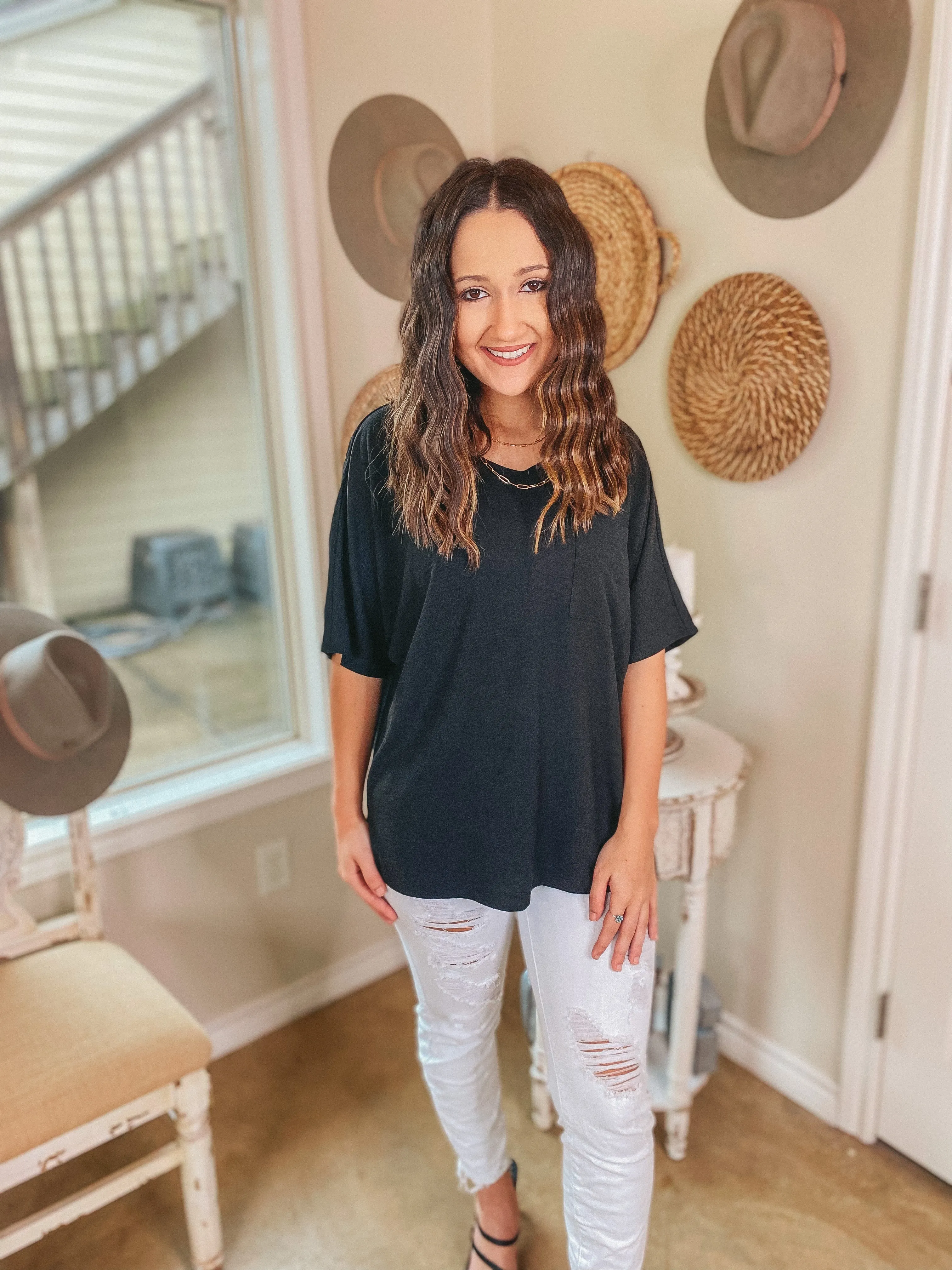 On Record V Neck Short Sleeve Shift Top with Front Pocket in Black